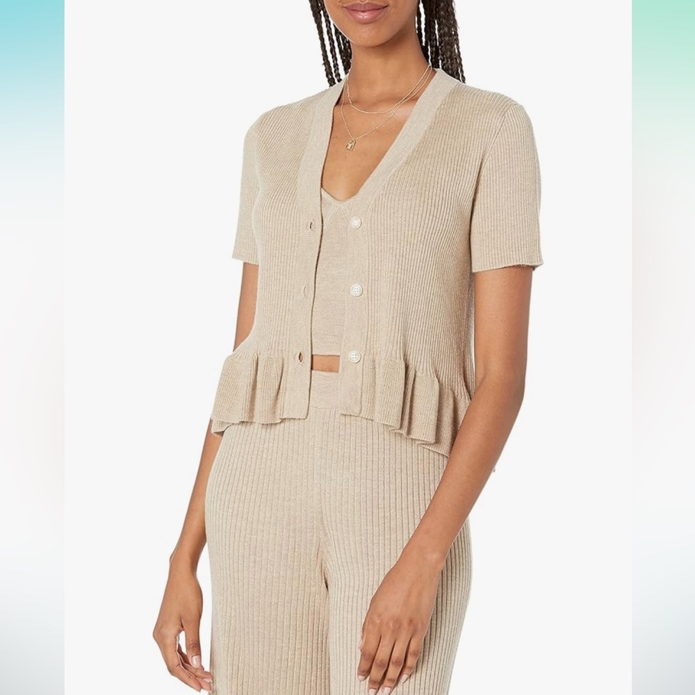 The Drop Peplum ruffle rib cardigan sweater